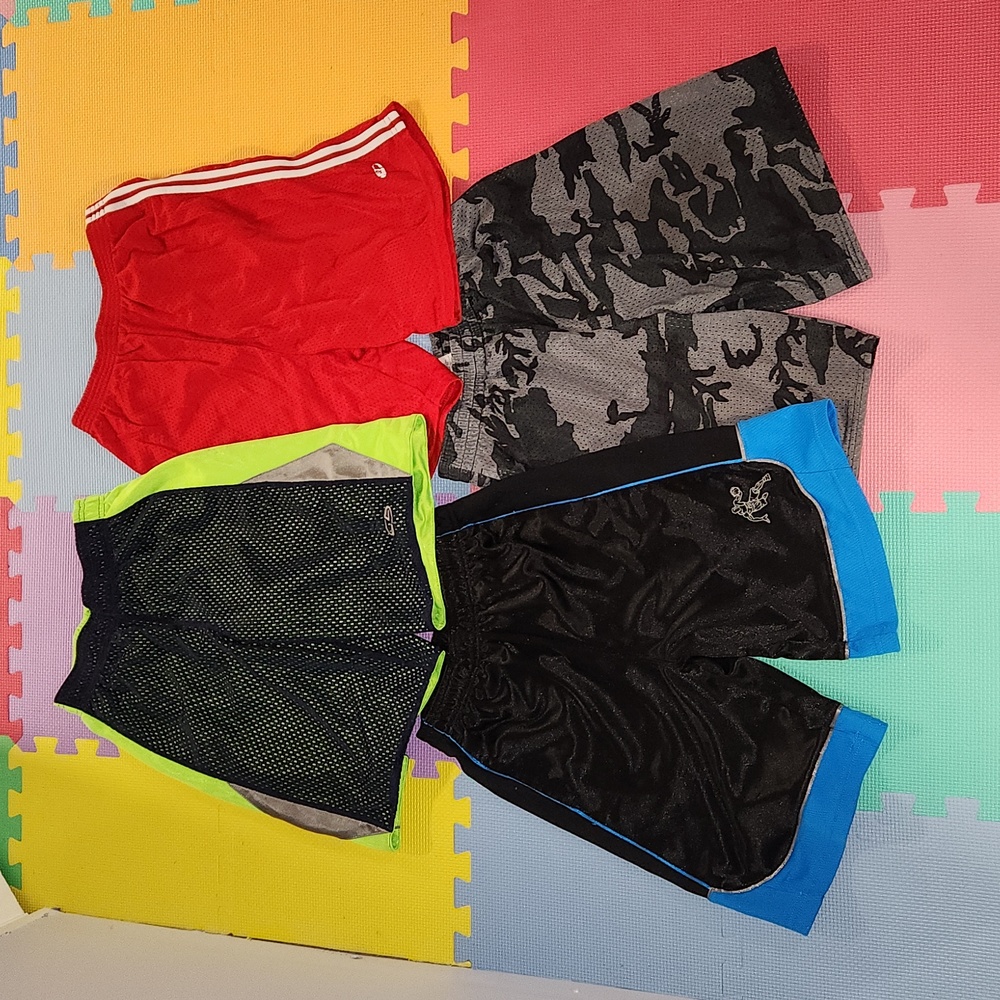 4 pairs of boys shorts size large, all different brands,  like new
